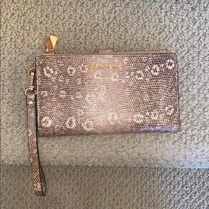 Michael Kors pink snake phone wristlet